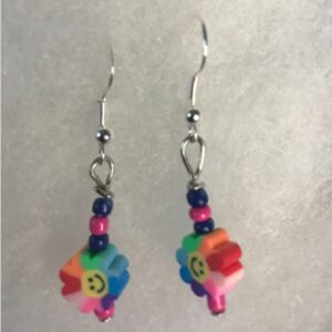 Happy flowers with navy blue and pink dark pink beads.  Designed by kids for kids